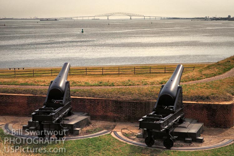 Francis Scott Key on the horizon with Rodman cannons at Fort McHenry.